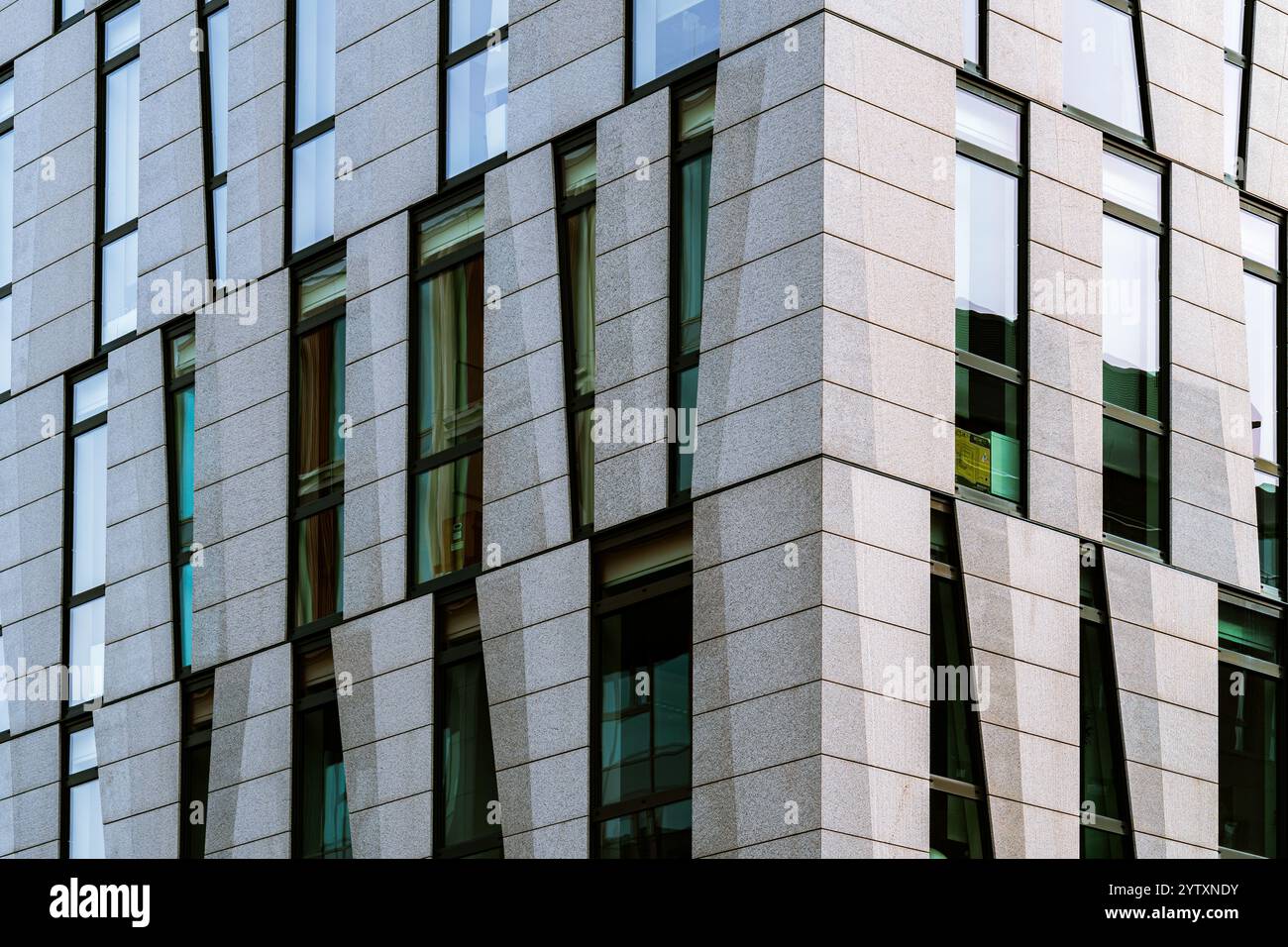 Contemporary Office Building Facade with Vertical Panels and Large ...