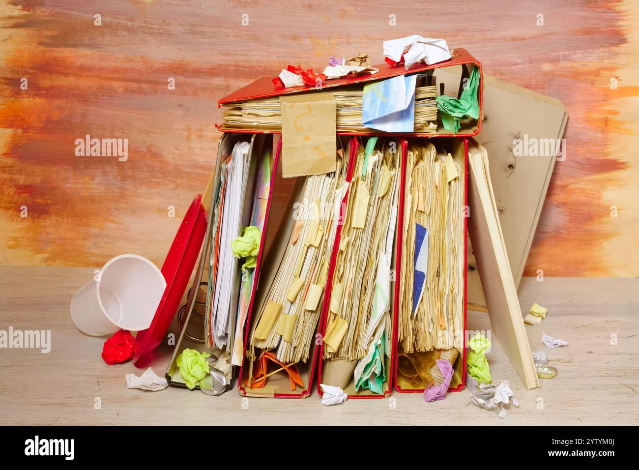 messy file folders and business records ,red tape, bureaucracy,red tape ...