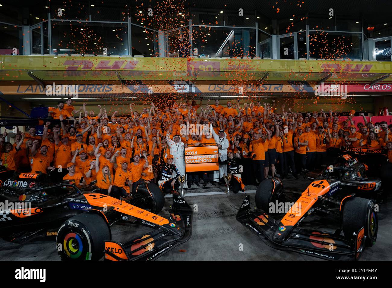 Mclaren team members celebrate winning the constructors championship ...