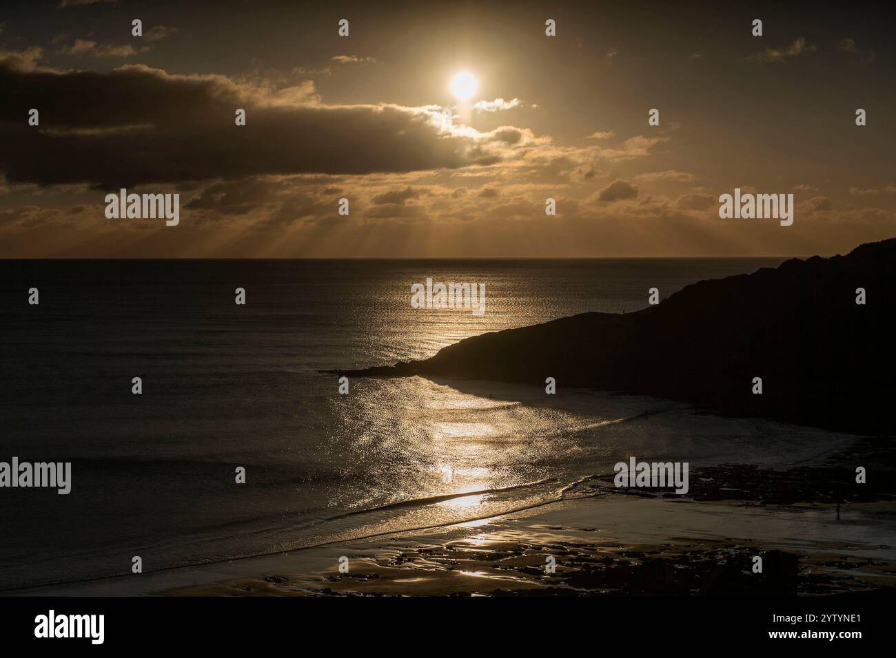 Swansea, UK. 08th Dec, 2024. The sun sets at the end of a sunny but chilly winters day at Langland Bay near Swansea this evening after the effects of Storm Darragh subside. Credit: Phil Rees/Alamy Live News Stock Photo