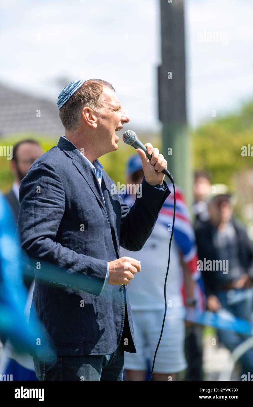 Jews Demonstrating A speaker calls for the government to stop groups