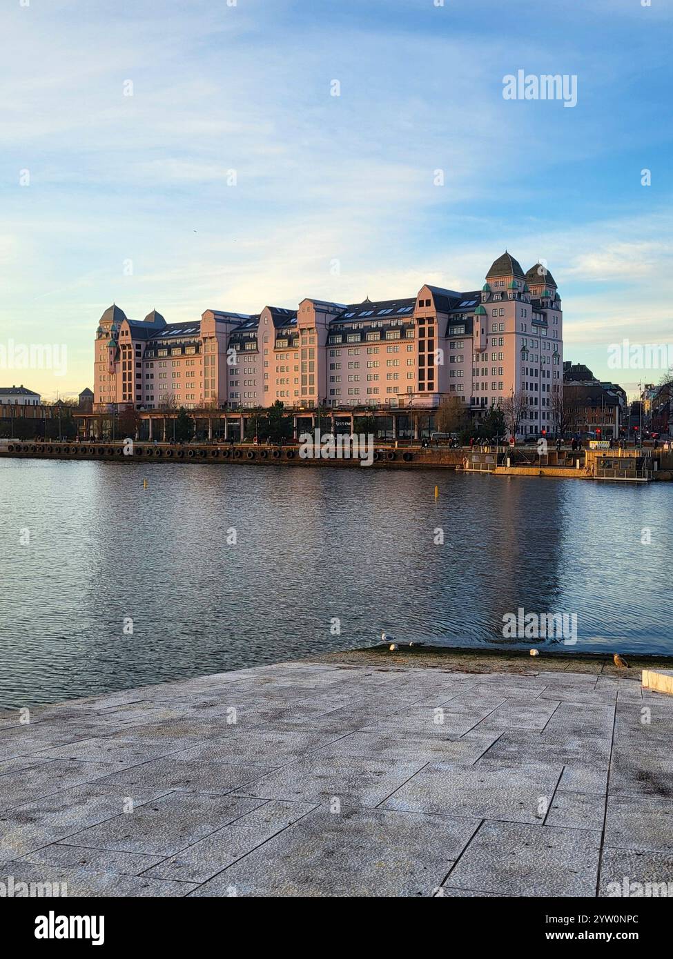 Grand Historic Building Under Blue Sky With Calm Water Reflection - Smartphone Captured Stock Image