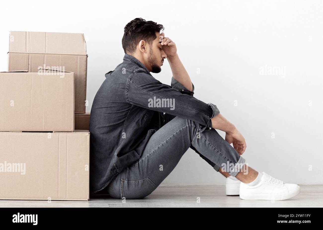 Exhausted arab man sitting hi-res stock photography and images - Alamy