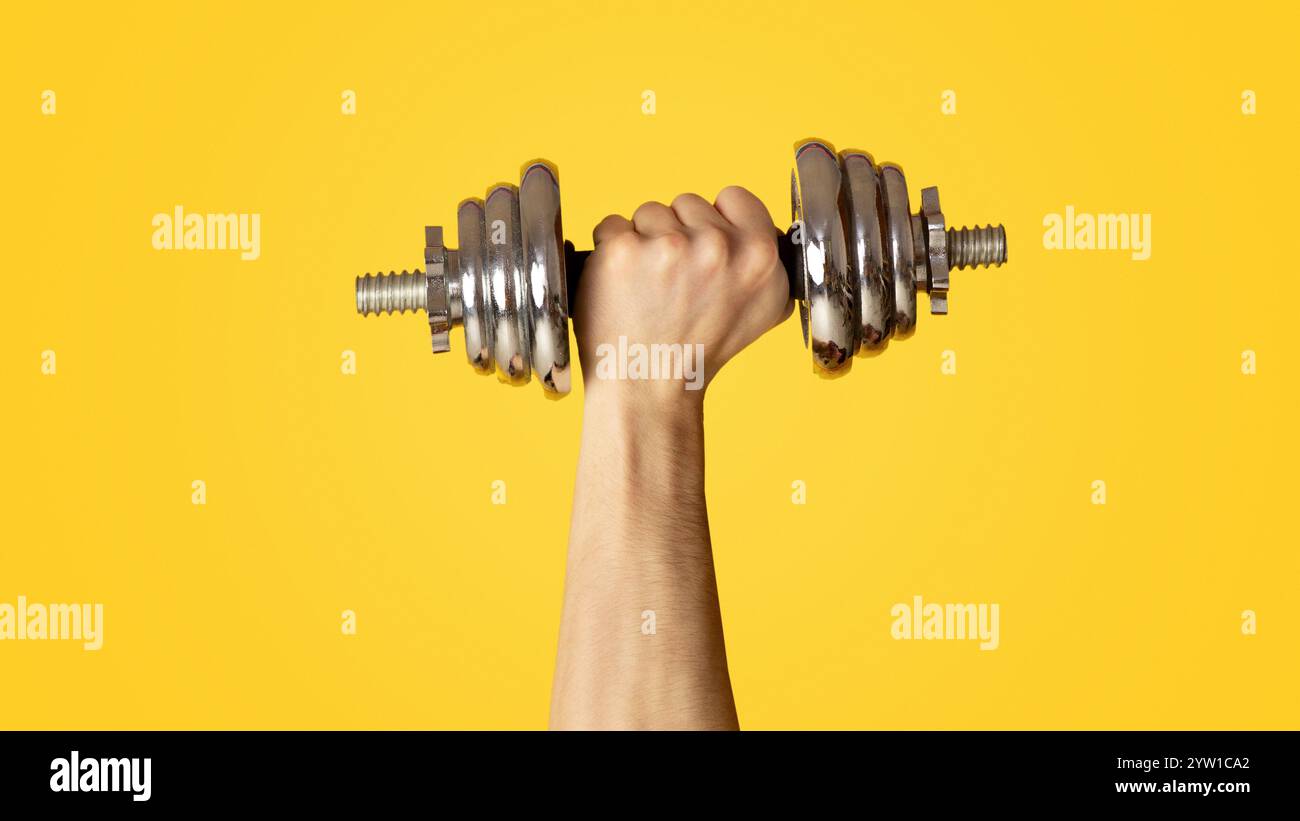 Man lifting heavy dumbbell hi-res stock photography and images - Alamy