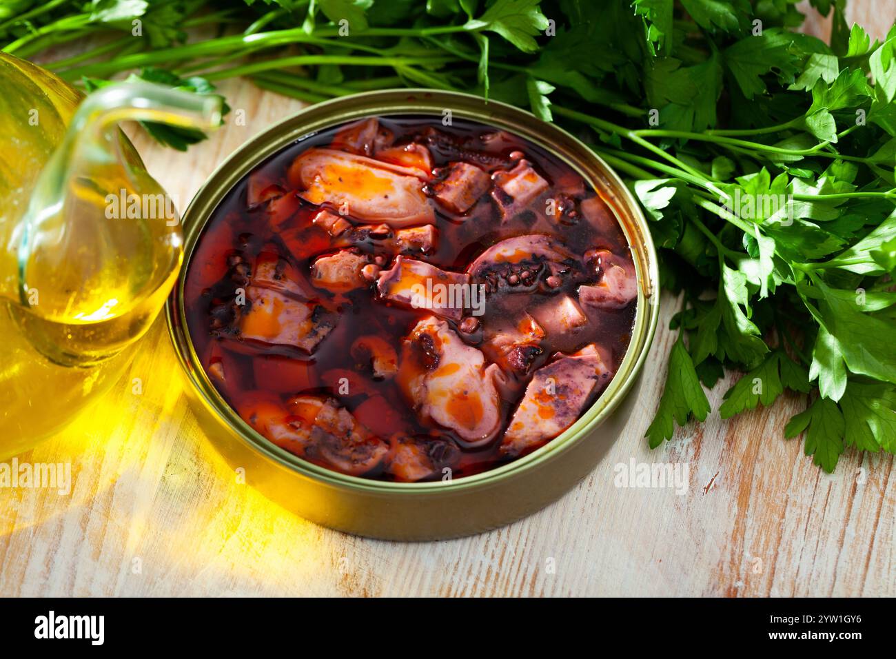 Giant squid tentacles in Galician sauce Stock Photo - Alamy