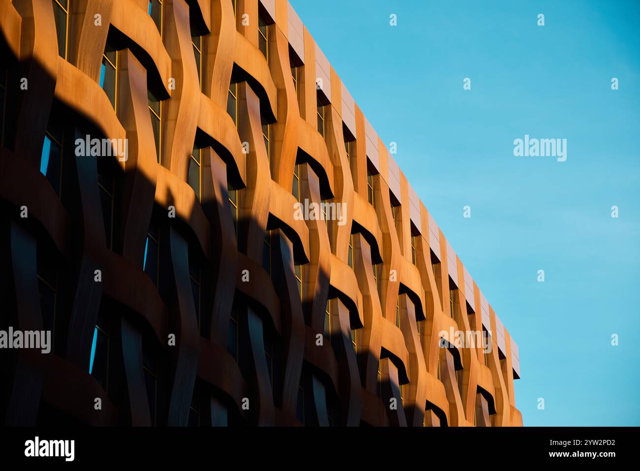 Modern architecture with a distinctive patterned facade enhances urban ...