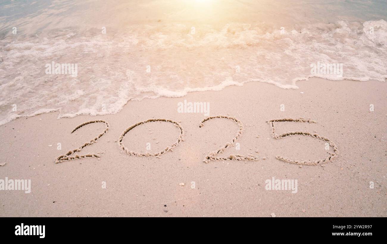 happy new year 2025. number 2024 write on sandy beach, ocean wave