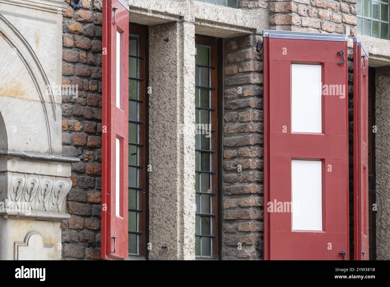 Red brick building with windows Stock Photo - Alamy