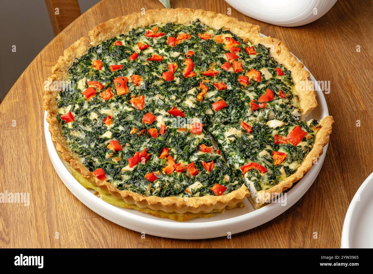pie with spinach, tomatoes and cheese Stock Photo