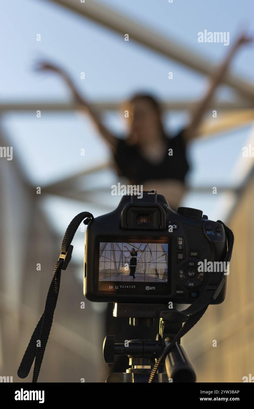 Young woman recording herself dancing hi-res stock photography and ...