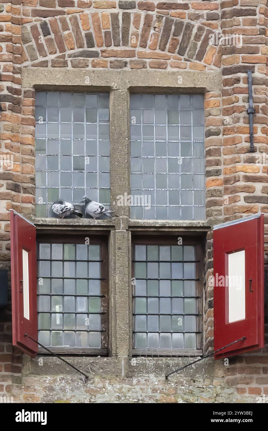 Red brick building with windows Stock Photo - Alamy
