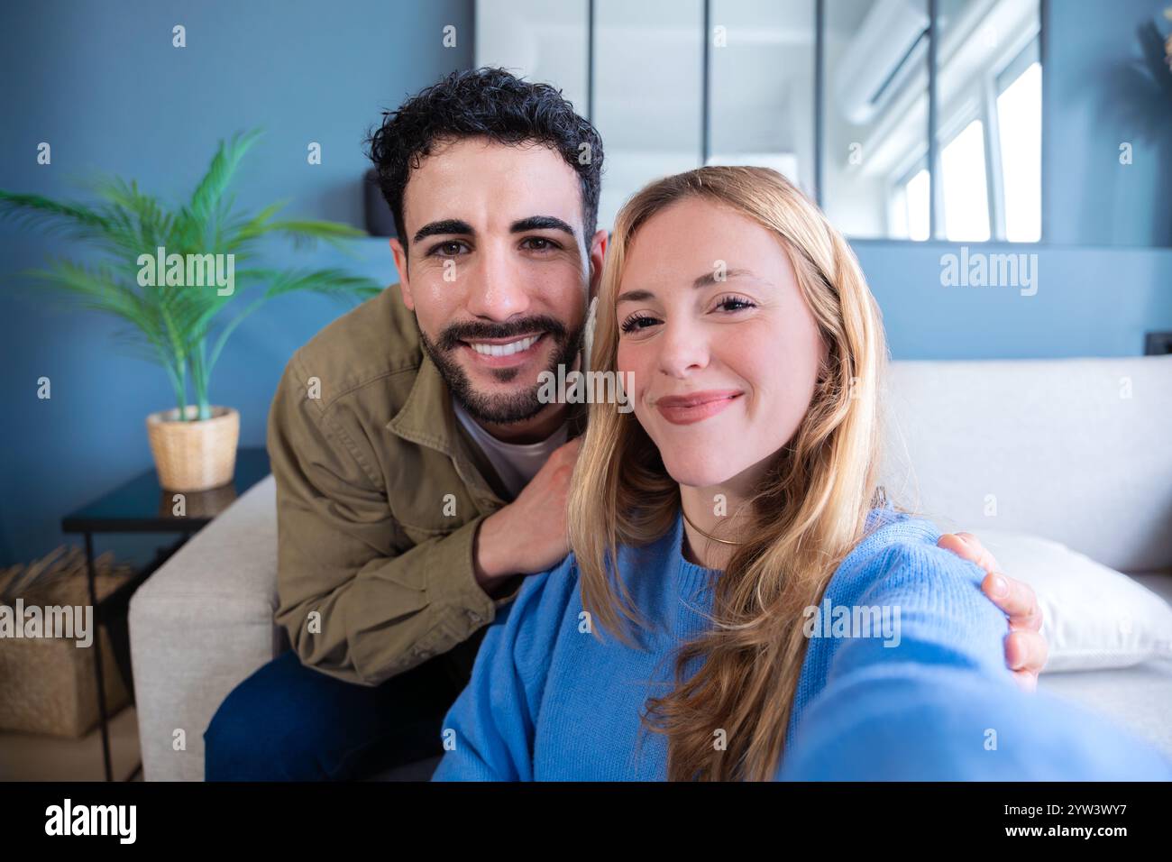 Couple taking selfie in cozy hi-res stock photography and images - Alamy