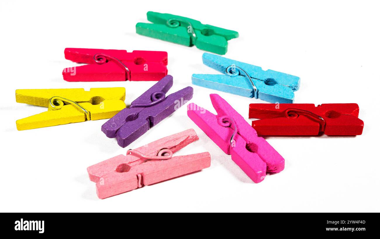 Multicolored clothespins isolated on white background. Stock Photo