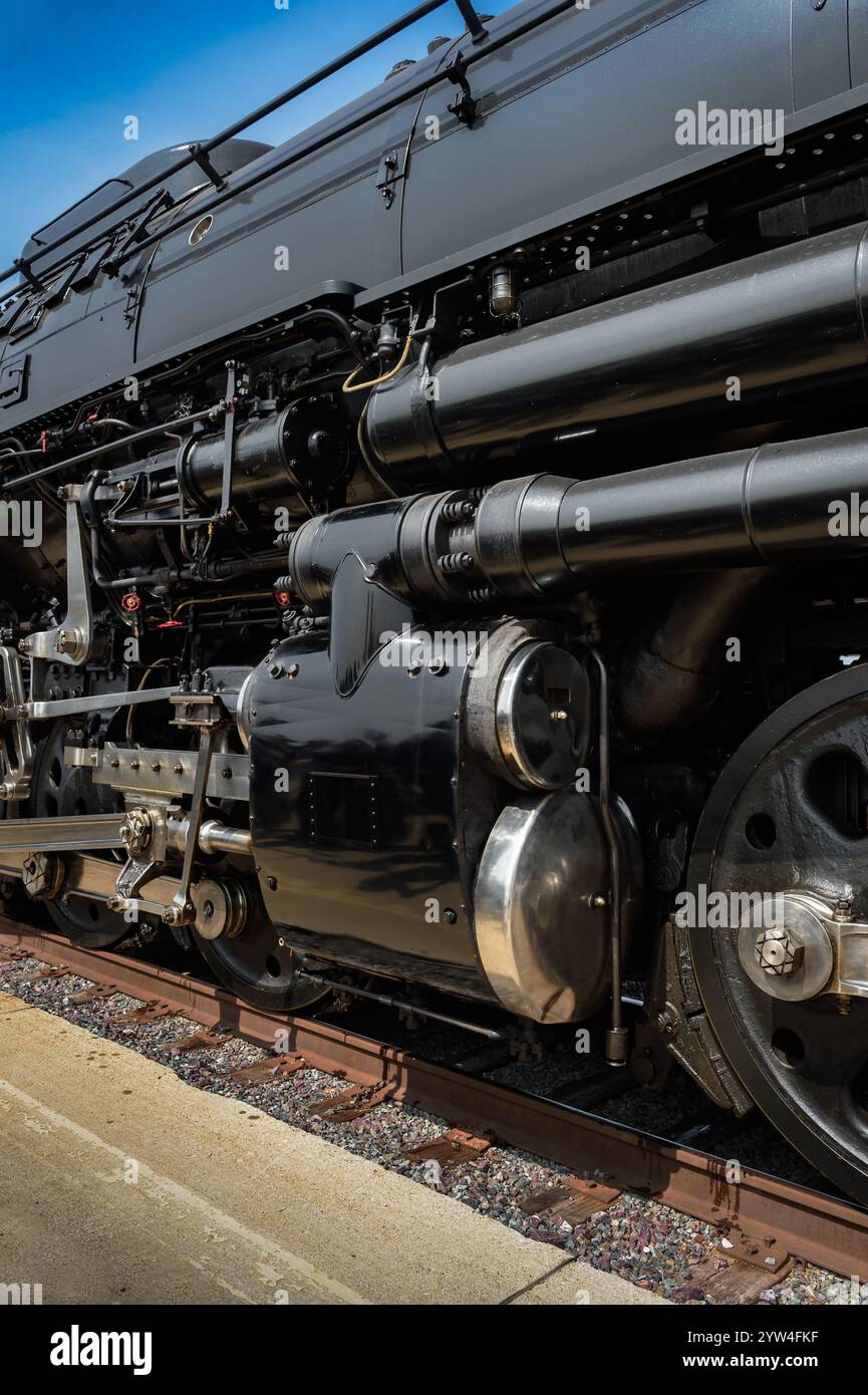 Side of Vintage Steam Locomotive Towers Over Rails Stock Photo - Alamy