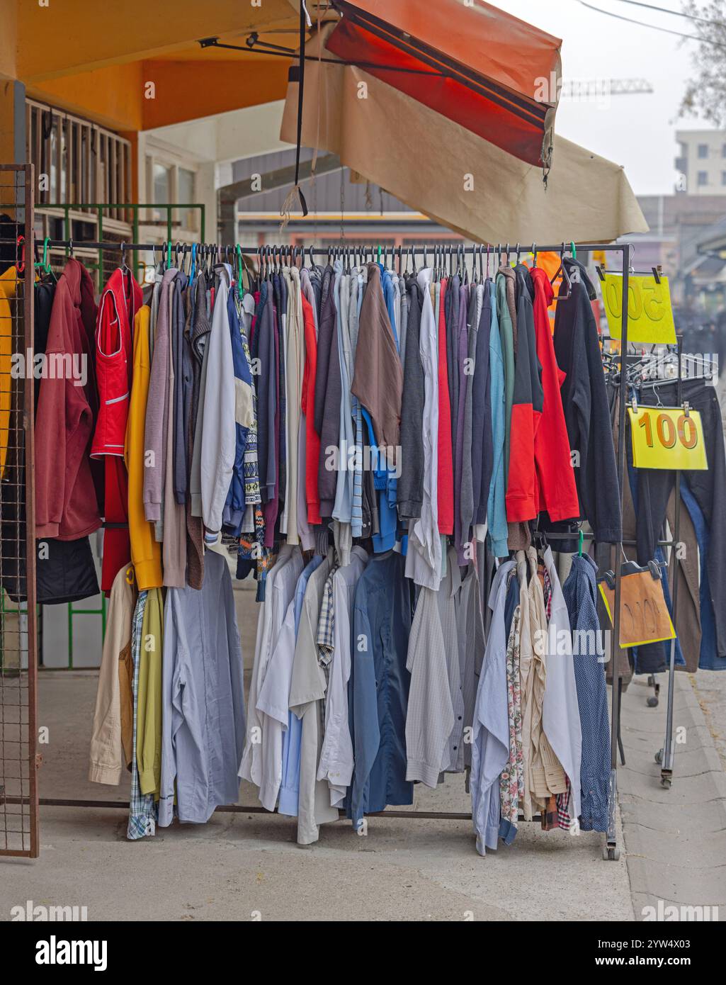 Second Hand Clothing for Sale Hanging at Rail in Front of Shop Stock ...