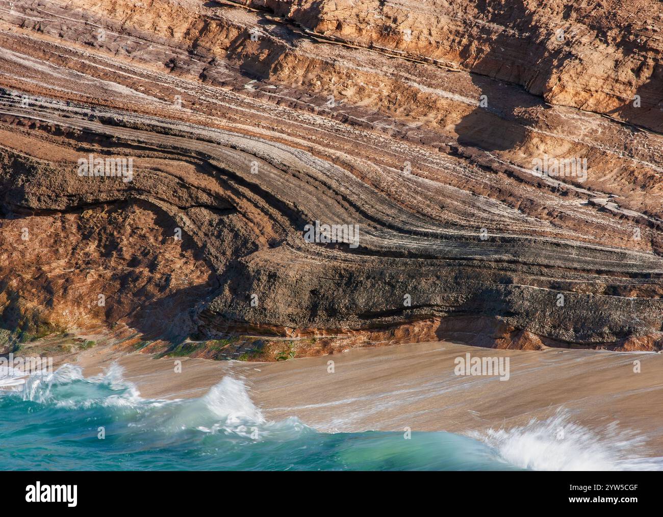 Volcanic and sediment layers on coastal cliffs on Fuerteventura, Canary Islands, Spain Stock Photo