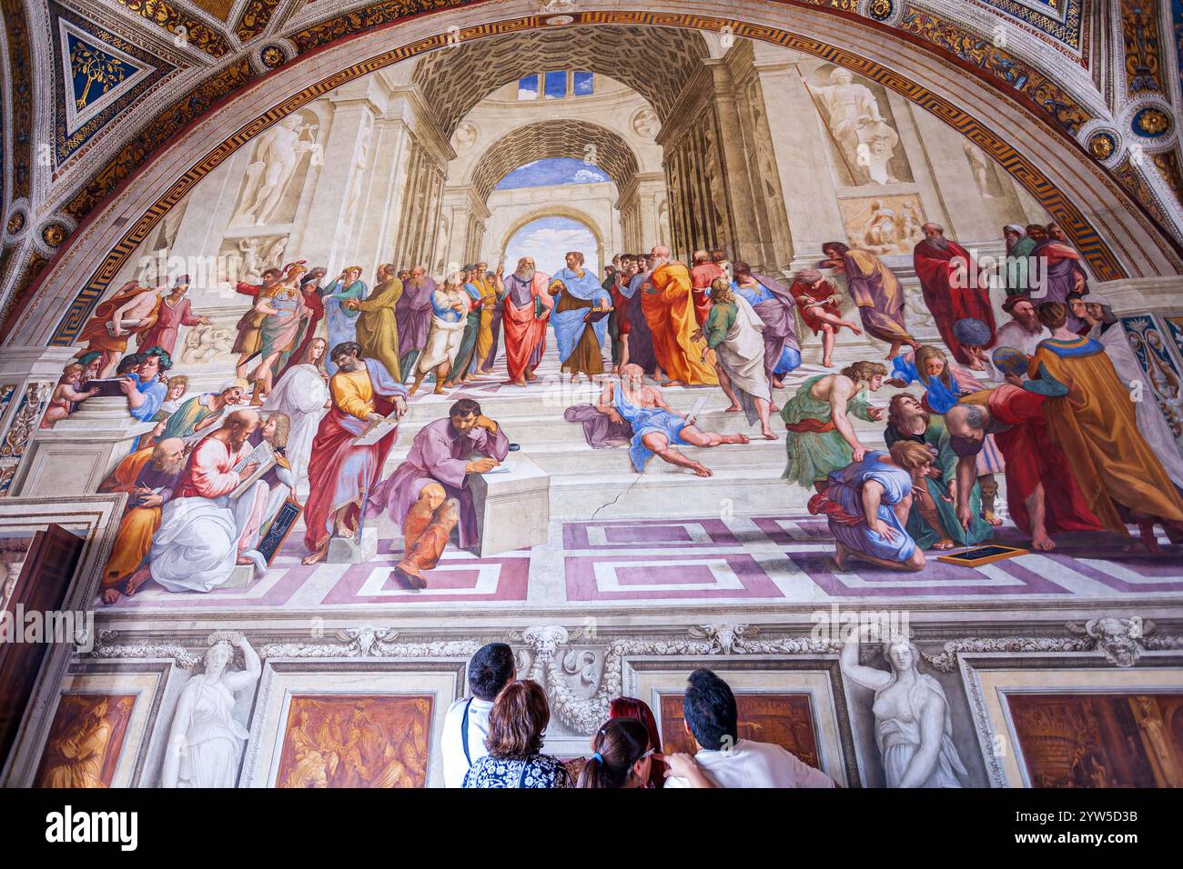 Rome, Italy, July 22 2017, A group of visitors marvels at Raphael's ...