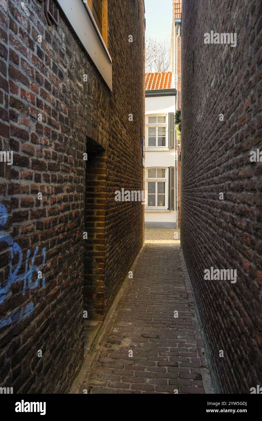 Narrow alleyway in old historic centre of Sittard province of Limburg, Netherlands. Stock Photo