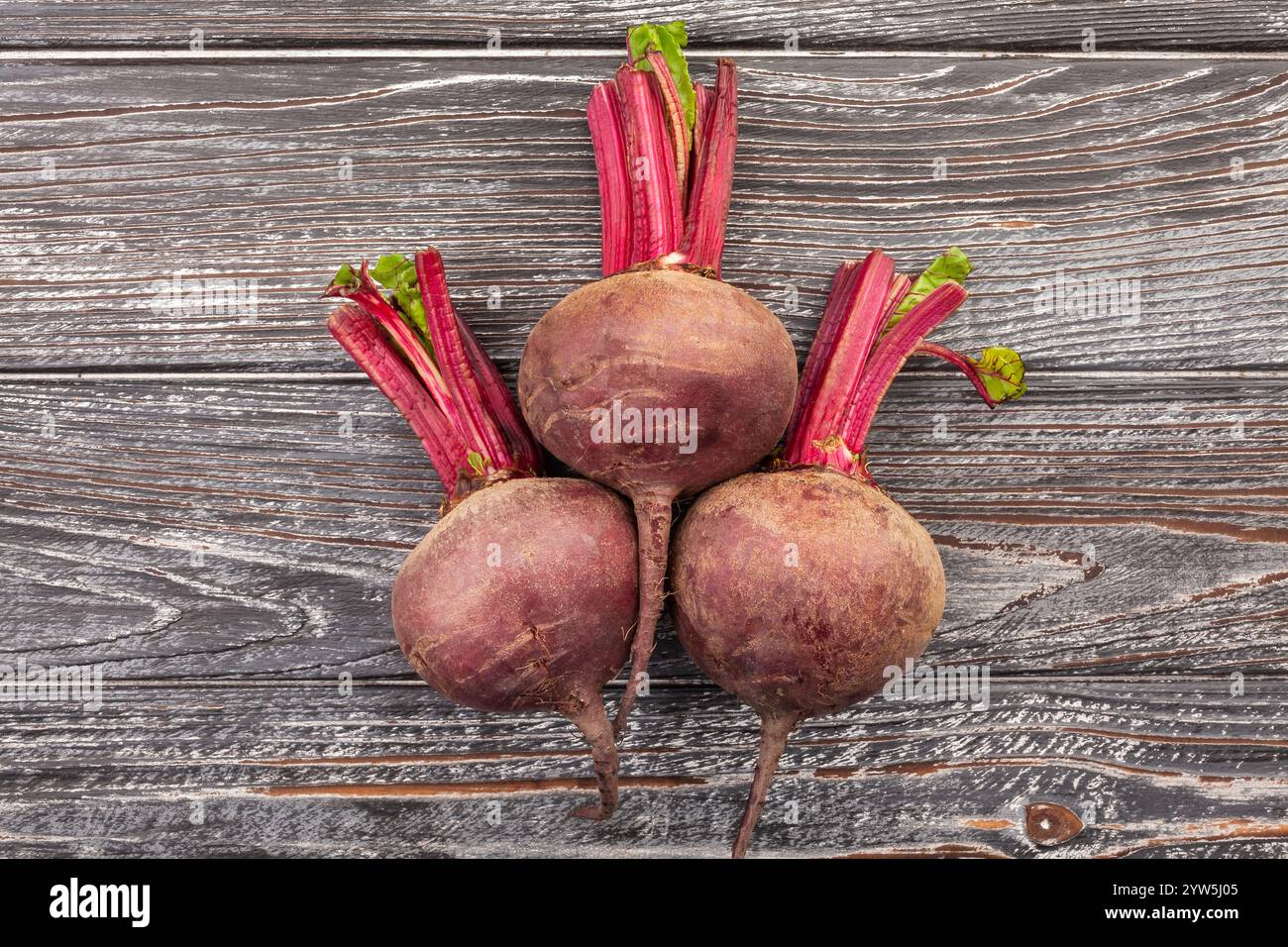 beets group on wood background top view Stock Photo