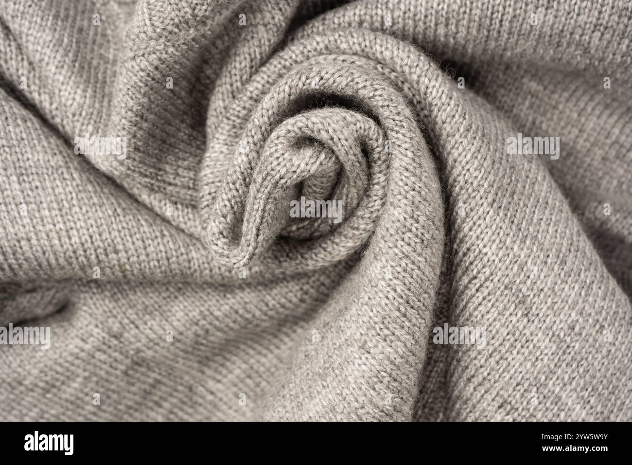 Grey wool sweater texture as a background. Top view. Stock Photo