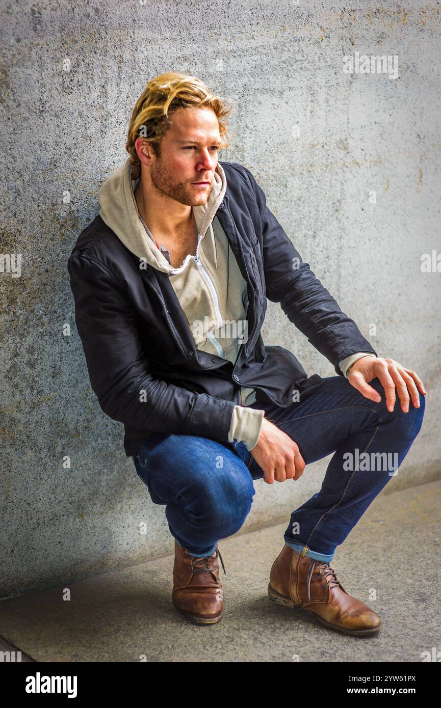 Person crouches down in hi-res stock photography and images - Alamy