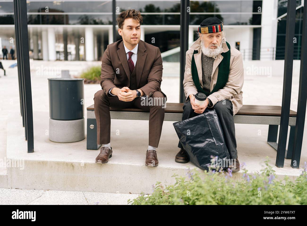 Rich Homeless Wide shot of chatting successful businessman and old homeless man ...