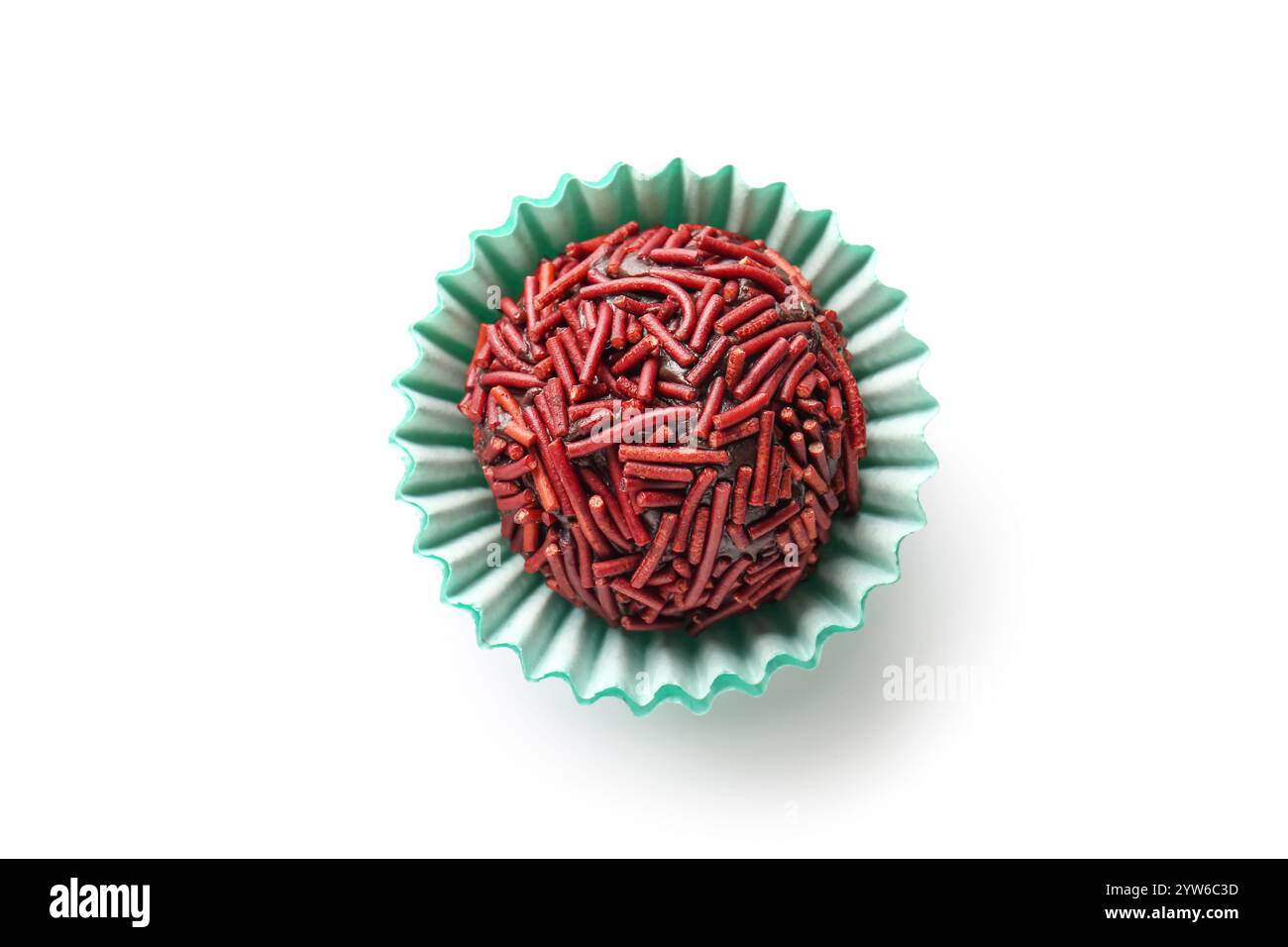 Delicious chocolate truffle in blue paper cup on white background Stock ...