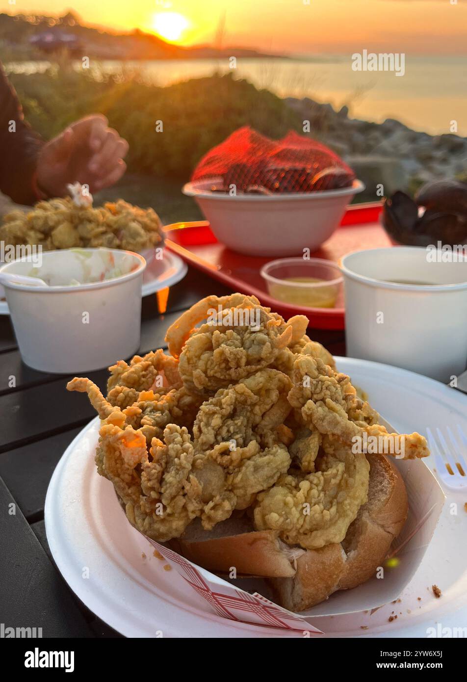 Fried Clam Roll Outdoor Dining On The Ocean - Smartphone Captured Stock Image