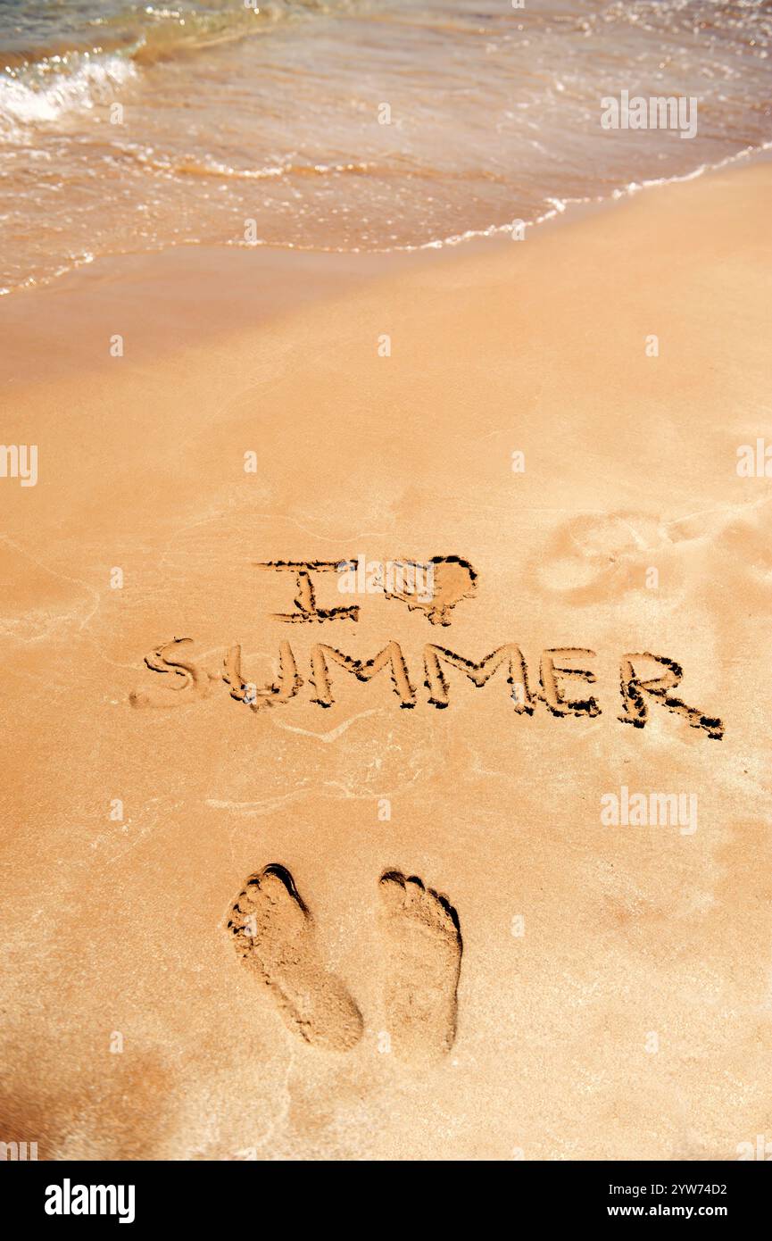 I Love Summer Written on Sandy Beach next to footprints Stock Photo - Alamy