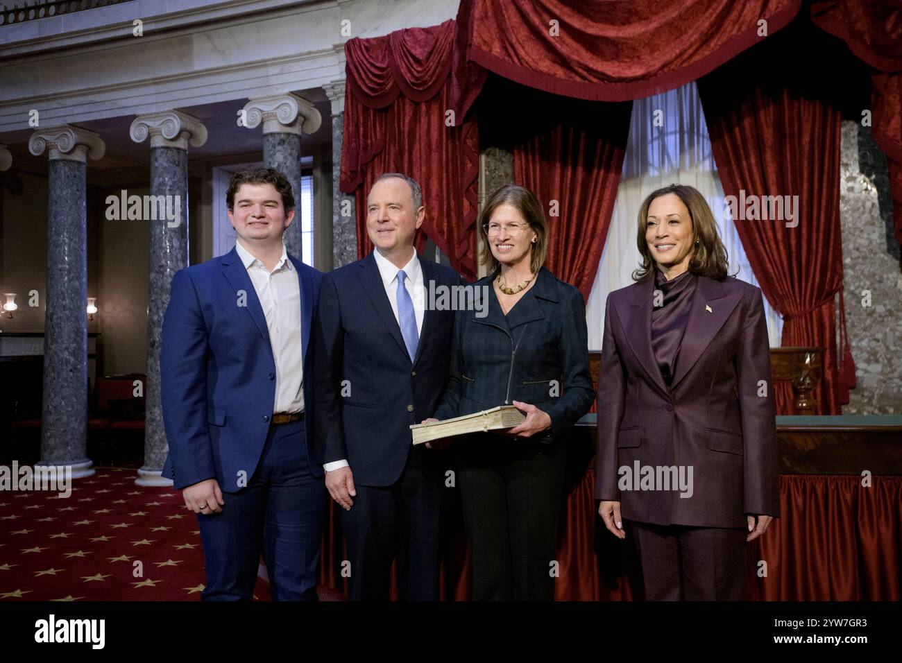 Vice President Kamala Harris, right, poses with Sen. Adam Schiff, D