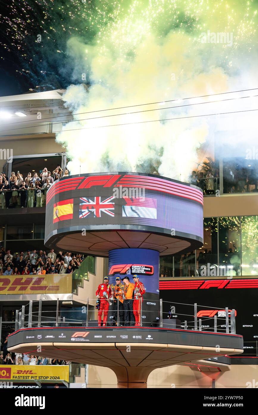 Abu Dhabi, United Arab Emirates. 08th Dec, 2024. (L-R) Carlos Sainz, Lando Norris, Zack Brown and Charles Leclerc celebrate the podium after the Formula One Abu Dhabi Grand Prix race at the Yas Marina Circuit. Credit: SOPA Images Limited/Alamy Live News Stock Photo