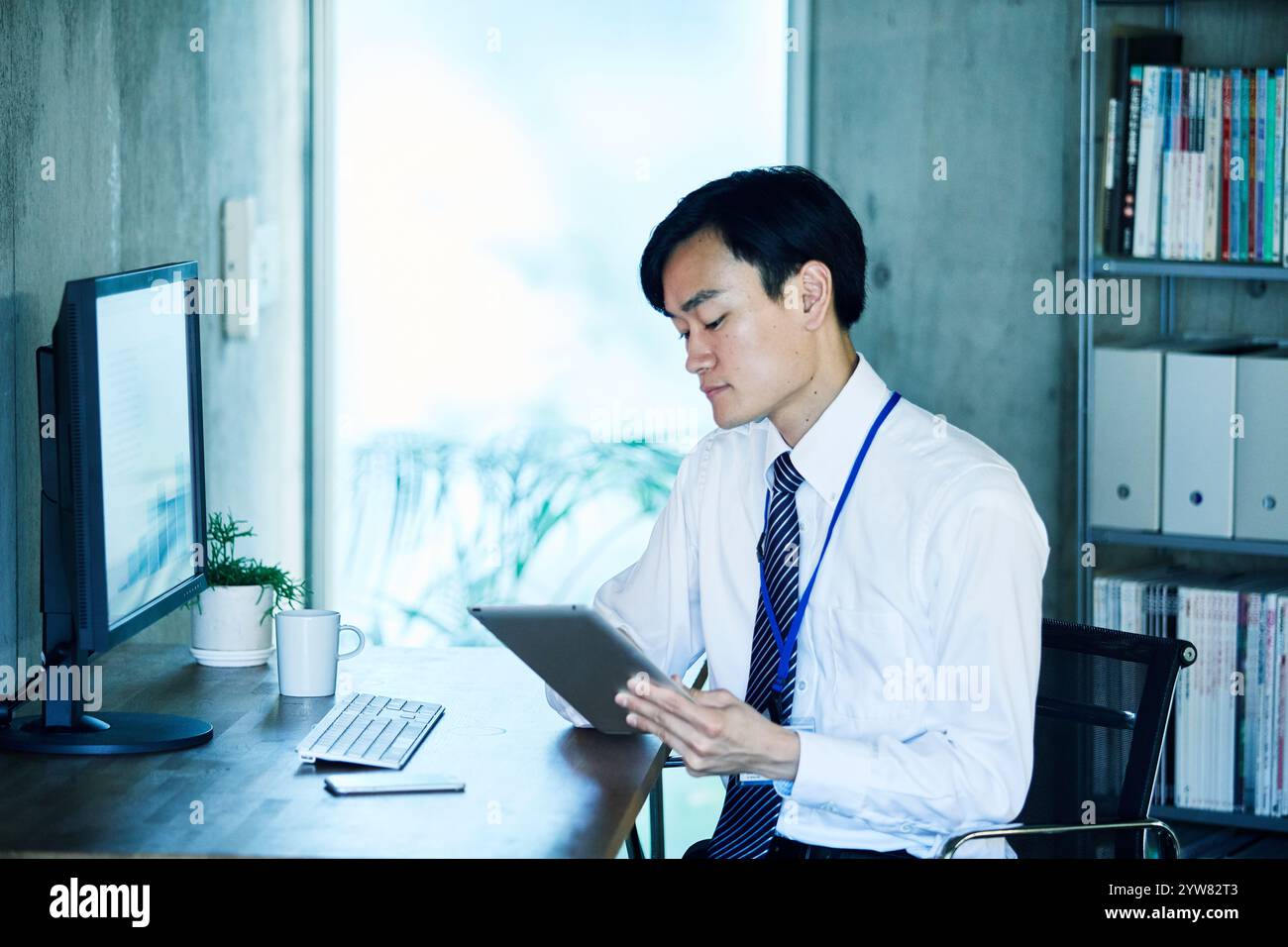 Businessmen working in an office Stock Photo