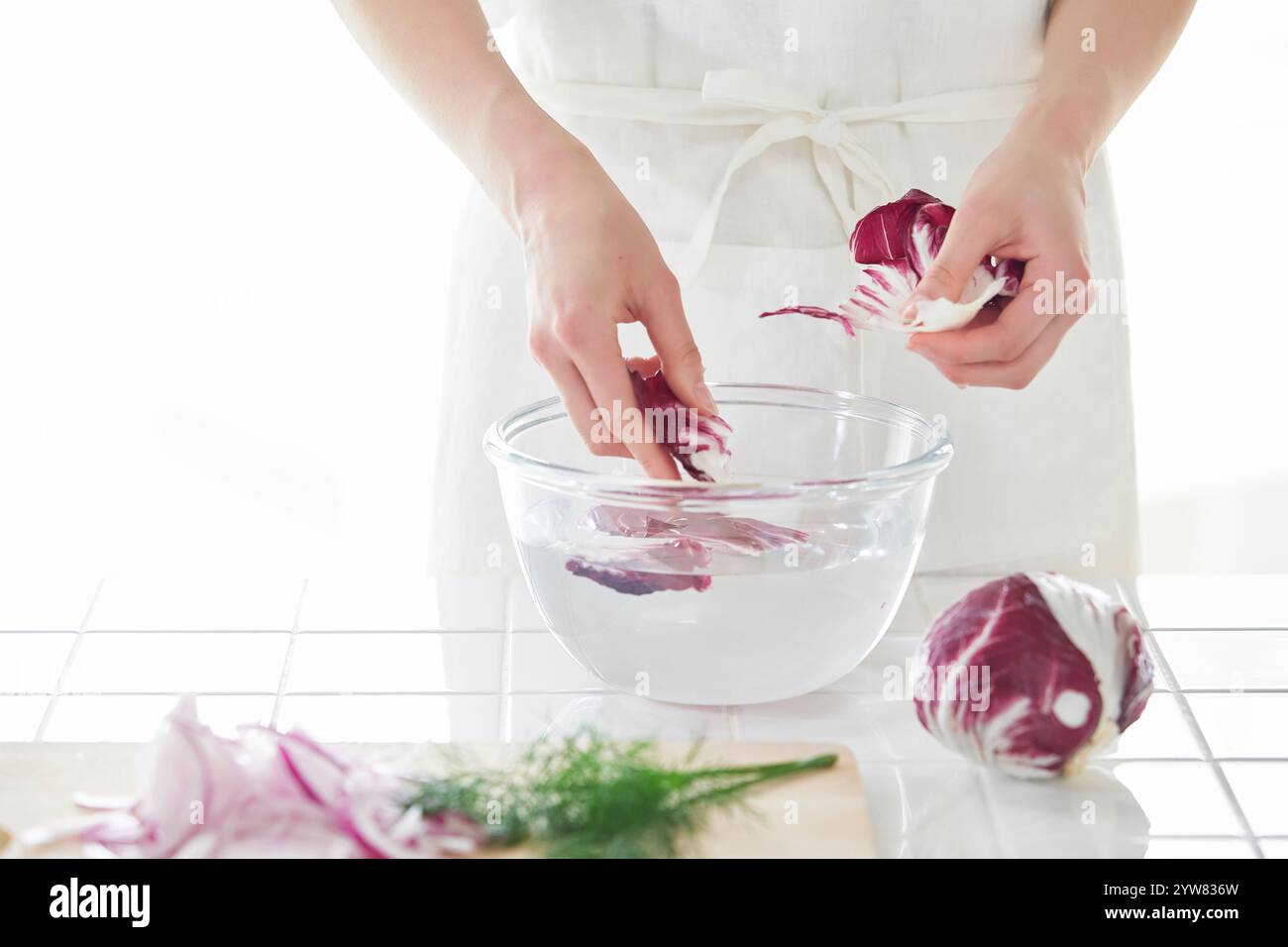 Faceless person cutting red onion hi-res stock photography and images ...