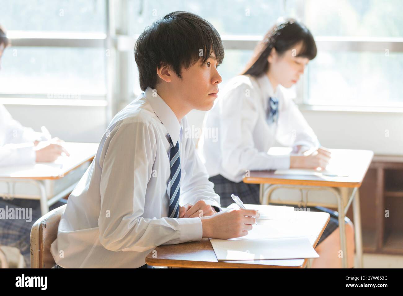 High school students studying in classroom Stock Photo - Alamy