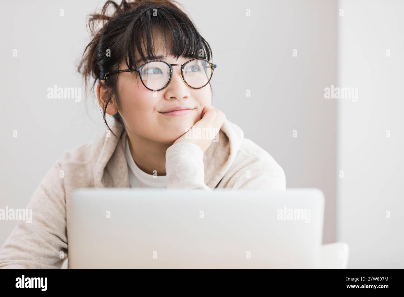Woman Operating a computer Stock Photo - Alamy