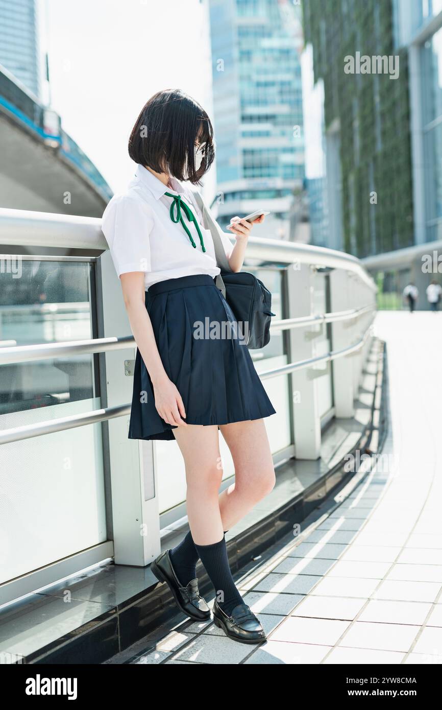 High school girls walking in Shibuya Stock Photo - Alamy