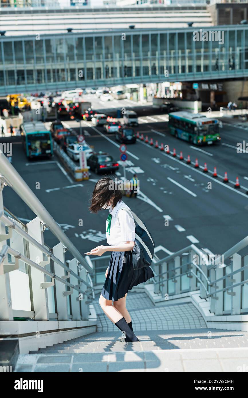 High school girls walking in Shibuya Stock Photo - Alamy