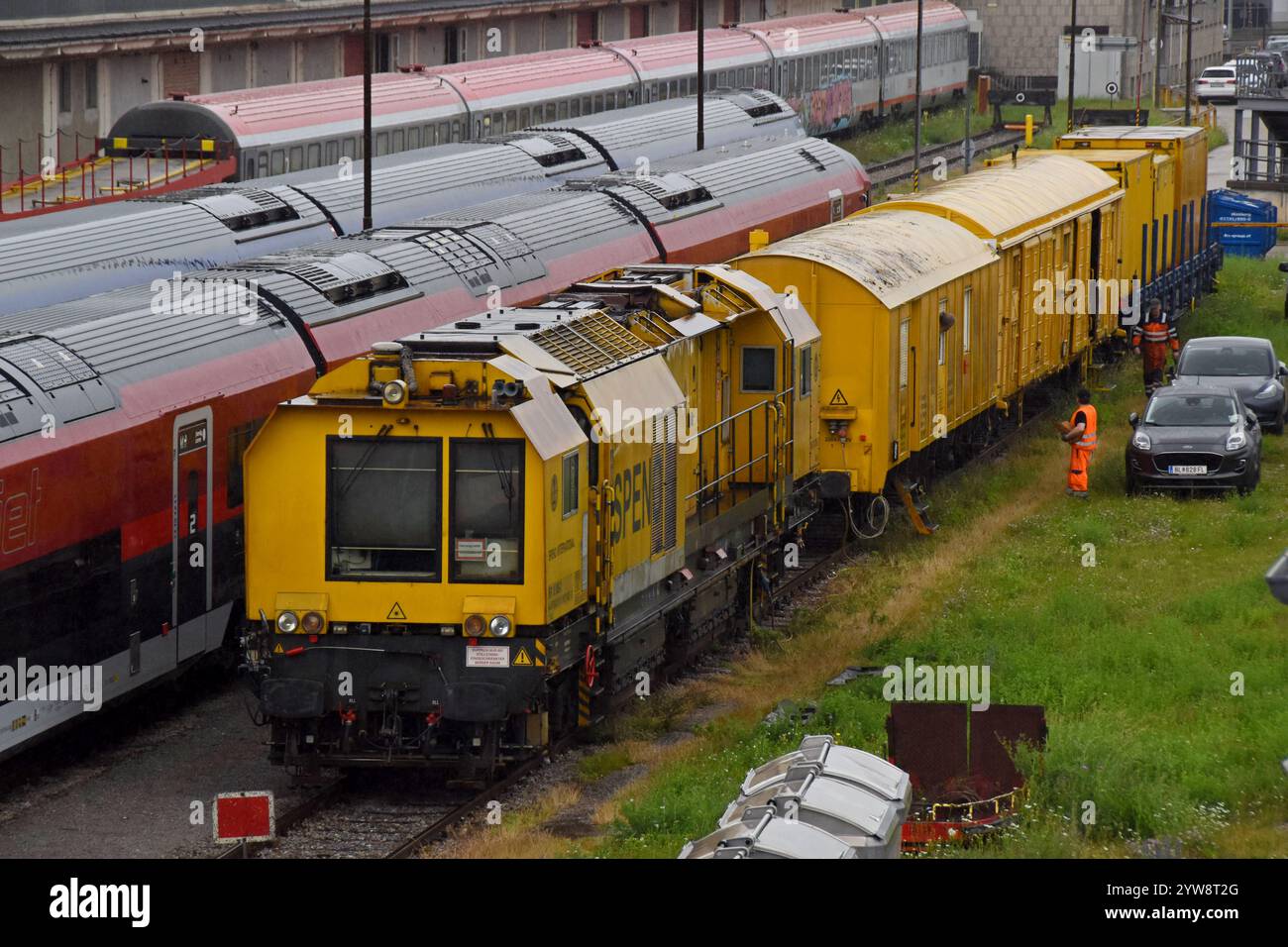 A permanent way and engineering mainetance train in the railway yards in Vienna, Austria Stock Photo