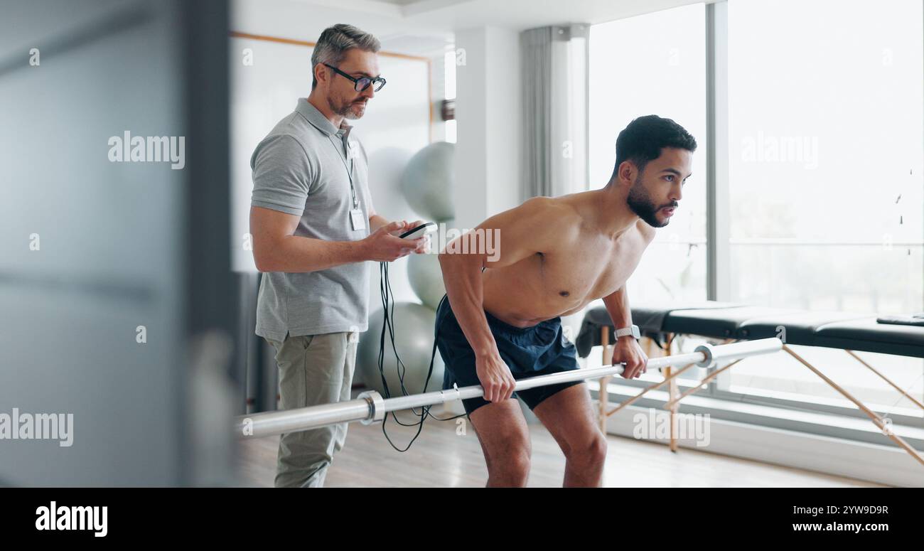 Physiotherapy, consulting and tracking with man in clinic for ...