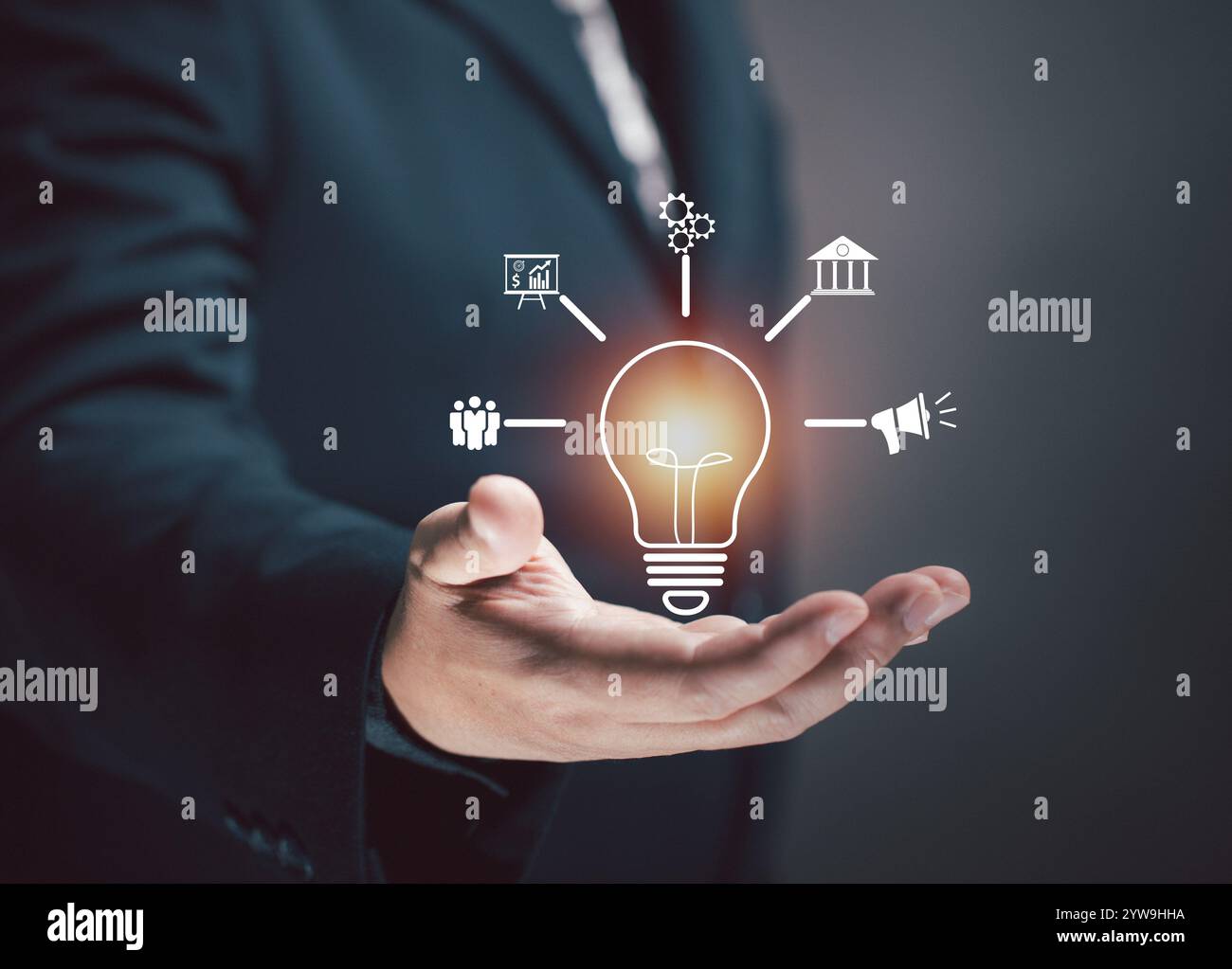 Business man show light bulb and idea in his hand with business ...