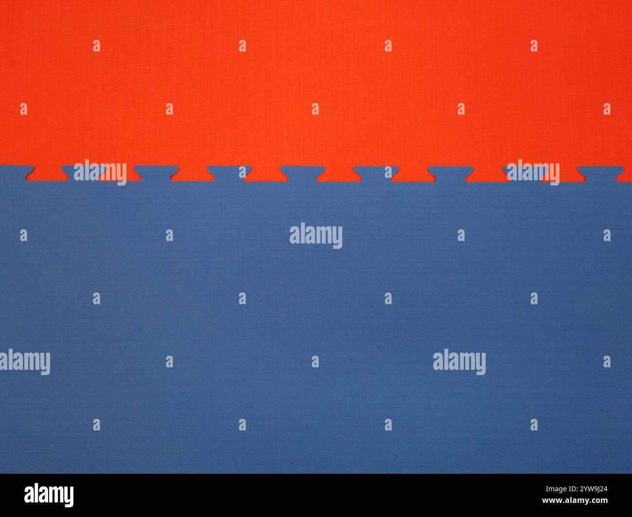 Tatami martial arts mat in red and blue, perfect as a texture or background for sports and martial arts designs.Full-frame Stock Photo