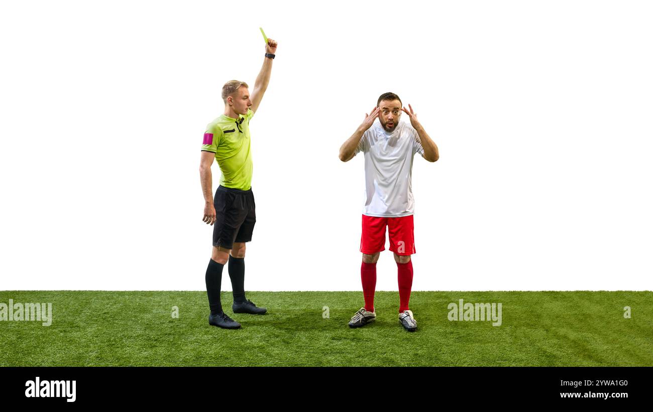 Referee raising yellow card to man, player showing confused expression ...