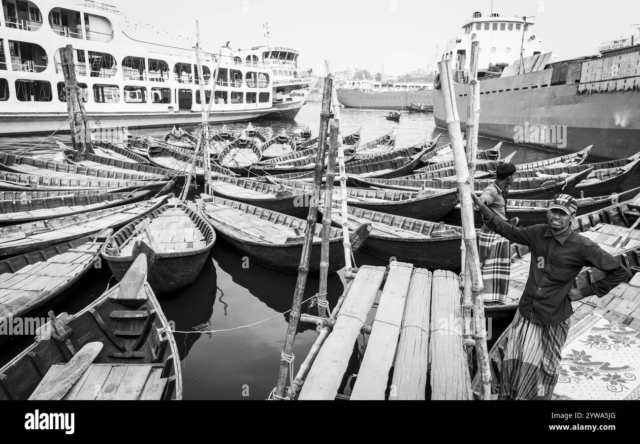 Person on boats Black and White Stock Photos & Images - Alamy