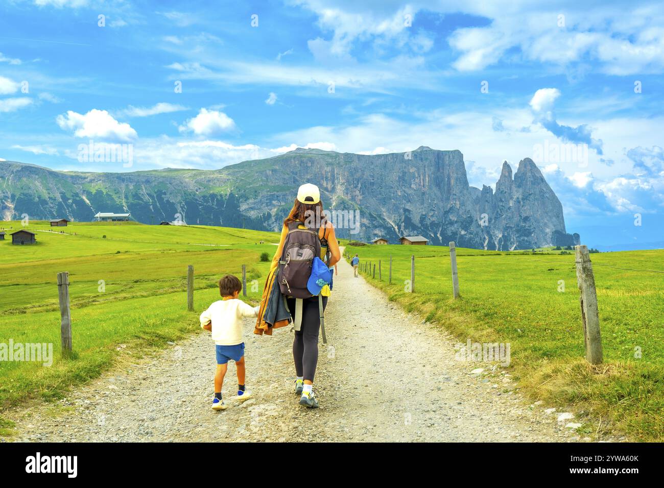 Mother and son enjoying a summer hike in the picturesque landscape of