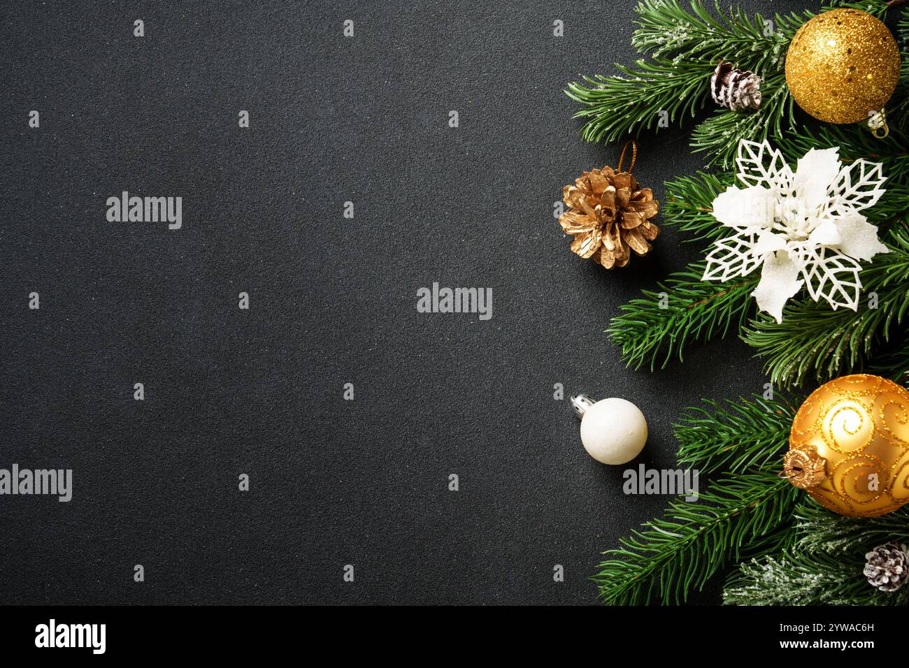 Christmas decorations and spruce tree at black background Stock Photo ...