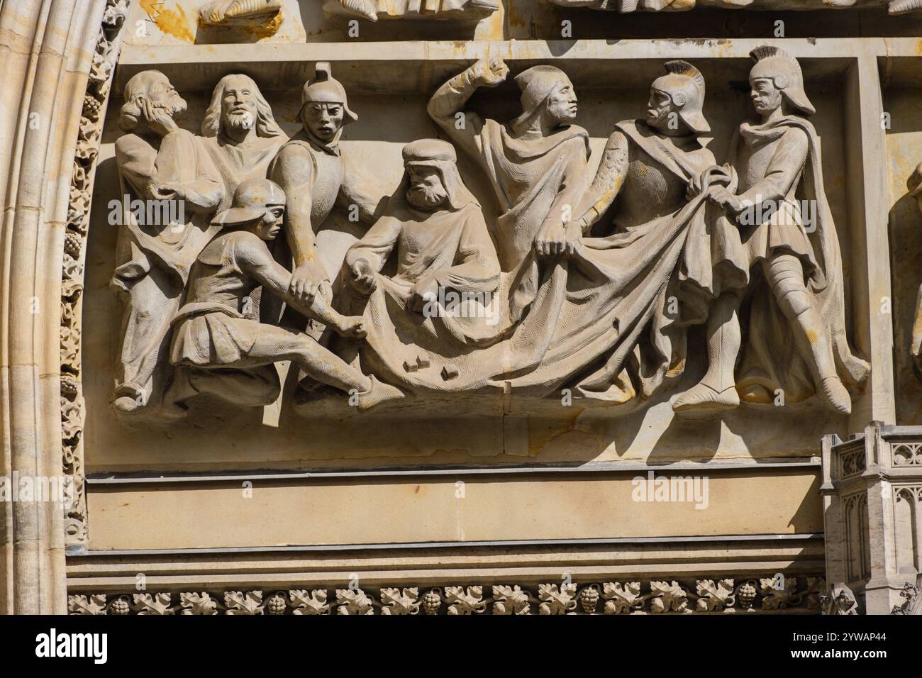 St. Vitus Cathedral, Stone Carving Showing the Casting of Lots for Jesus's Cloak, Prague, Czech Republic, Czechia Stock Photo