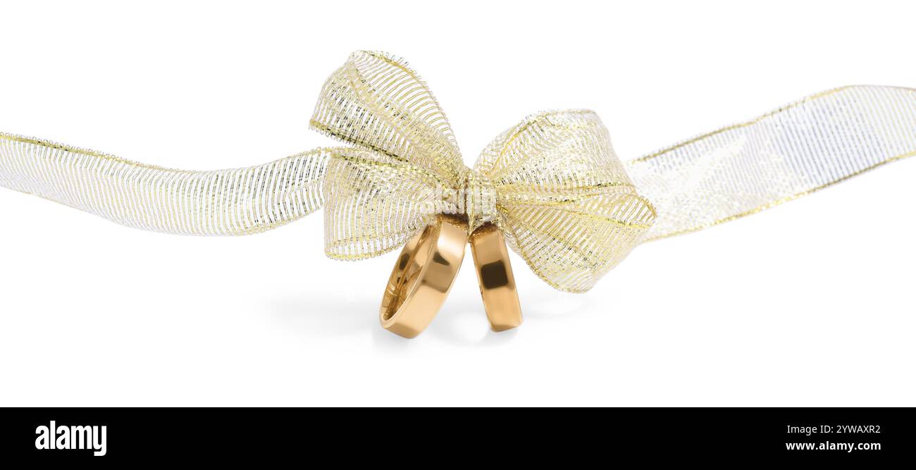 Wedding rings tied with ribbon on white background Stock Photo - Alamy
