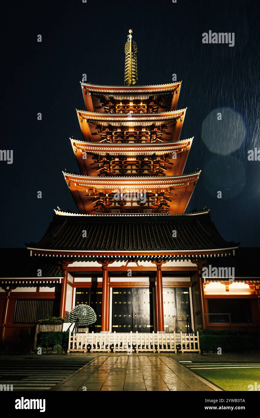 Traditional Japanese pagoda under night rain Stock Photo - Alamy