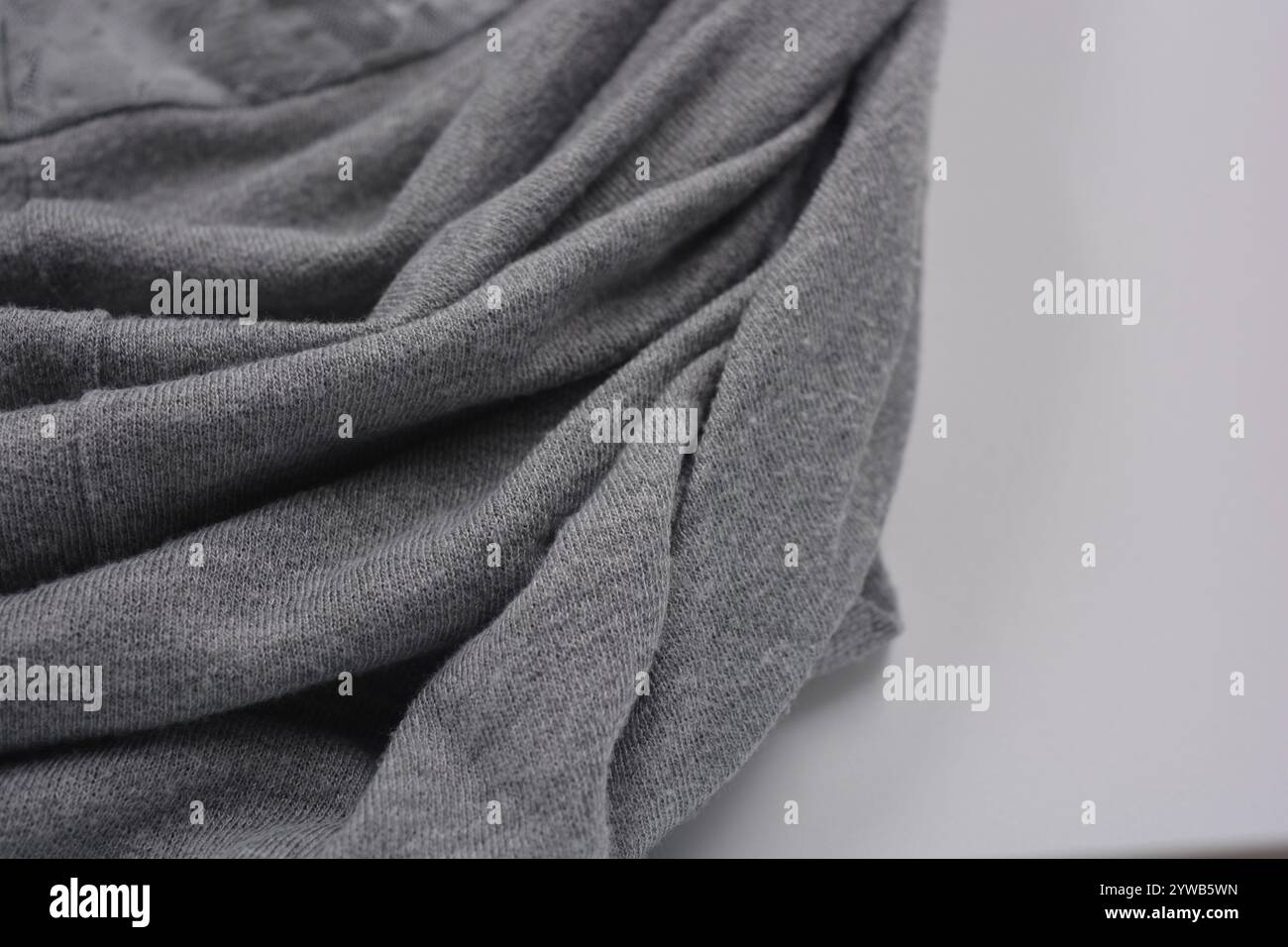 Unusual gray thin summer fabric. The synthetic, soft fabric is