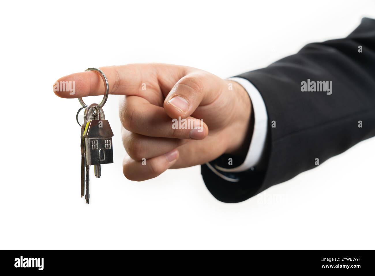 Close-up of house keys held by male real estate agent salesman landlord ...